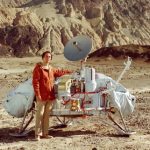 carl sagan standing next to lander